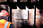 Checking out the plaque.